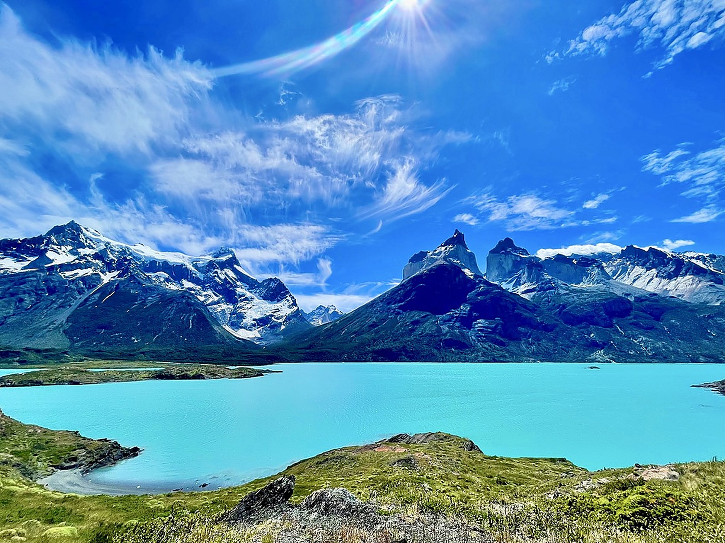 Turquoise glacial lake framed by the granite peaks of Torres del Paine, Patagonia